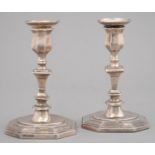 A PAIR OF EDWARD VII OCTAGONAL SILVER CANDLESTICKS, THE MOULDED FOOT INSCRIBED To Miss J Sim A token