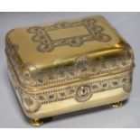 A FRENCH GILT BRASS JEWEL CASKET, C1880 IN THE MANNER OF TAHAN, PARIS, ENGRAVED WITH WIDE BANDS OF