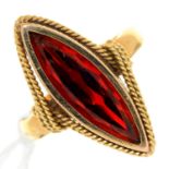 A NAVETTE SHAPED RED PASTE RING, 20TH C, IN GOLD, INDISTINCT FOREIGN CONTROL MARK, 5.6G,   SIZE K