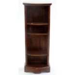 A MAHOGANY BOW FRONTED NARROW OPEN BOOKCASE, 20TH C, IN VICTORIAN STYLE, WITH MARBLE SLAB AND FAUX