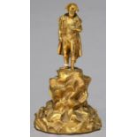 A GILT BRONZED METAL STATUETTE OF NAPOLEON BONAPARTE, 20TH C, STANDING ON ROCKS, 16.5CM H Good