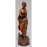 A FRENCH FRUITWOOD STATUETTE OF A WOMAN, 19TH C, IN DIAPHANOUS DRAPERY, ARMBAND AND SANDALS, ON