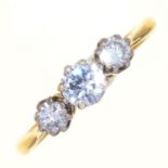 A DIAMOND THREE STONE RING WITH ROUND BRILLIANT CUT DIAMONDS IN 18CT GOLD, SHEFFIELD 1978, 2.6G Good