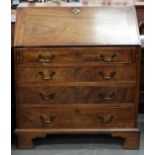 A GEORGE III MAHOGANY BUREAU, C1800, WITH FITTED INTERIOR ABOVE FOUR DRAWERS, ON BRACKET FEET, 108CM