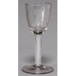 A WINE GLASS, 19TH C,  SODAMETAL, THE ROUND FUNNEL BOWL ENGRAVED WITH BIRDS AND EARS OF WHEAT, ON