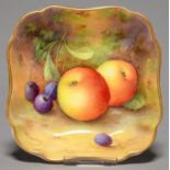 A ROYAL WORCESTER SHAPED SQUARE DISH, 1935, PAINTED A SHUCK, SIGNED, WITH AN ALL OVER STILL LIFE