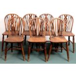 A SET OF FOUR ASH WHEEL BACK CHAIRS, EARLY 20TH C AND A CONTEMPORARY SET OF THREE, SIMILAR (7) All