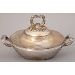 A FRENCH SILVER VEGETABLE DISH AND COVER WITH LOOP HANDLES AND REEDED RIMS, ENGRAVED WITH ARMORIALS,