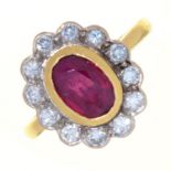 A RUBY AND DIAMOND CLUSTER RING, IN 18CT GOLD, LONDON 1996, 5.1G,  SIZE N Good condition