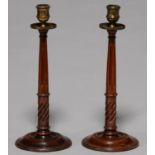 A PAIR OF TURNED MAHOGANY CANDLESTICKS, 20TH C, IN GEORGE III STYLE, WITH EARLY ASSOCIATED LACQUERED