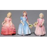 THREE ROYAL DOULTON BONE CHINA FIGURES OF GIRLS, 13CM H AND C, PRINTED MARKS, PAINTED HN NUMBERS