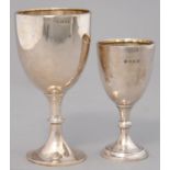 A GEORGE V SILVER CUP, 14CM H, MAKER'S MARK RUBBED, LONDON 1930 AND ANOTHER, SIMILAR BUT SMALLER,