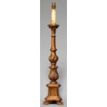 A GILTWOOD TABLE LAMP IN THE FORM OF A BAROQUE ALTER CANDLESTICK, MID 20TH C Much old accretion of