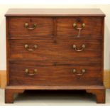 A GEORGE III MAHOGANY CHEST OF DRAWERS, C1800, FITTED TWO SHORT AND TWO LONG GRADUATED DRAWERS
