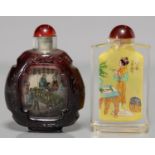 A CHINESE RUBY CASED AND INTERIOR PAINTED GLASS SCENT BOTTLE AND ANOTHER CHINESE INTERIOR PAINTED