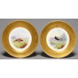 A PAIR OF MINTON GAME BIRD PLATES,   PAINTED C1930, DECORATED WITH PHEASANT OR PTARMIGAN AND