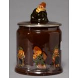 A ROYAL DOULTON SILVER MOUNTED KINGSWARE FORTY THIEVES TOBACCO JAR AND COVER, EARLY 20TH C, 17CM