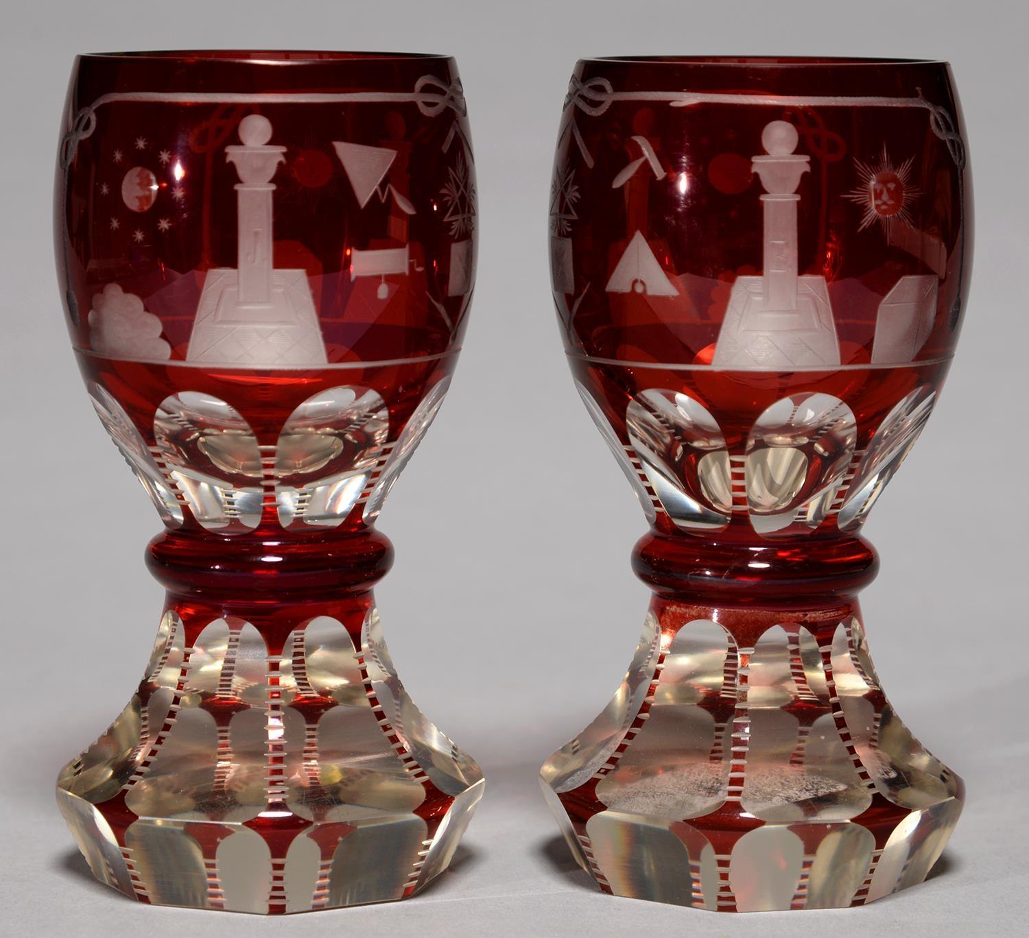 TWO BOHEMIAN RUBY FLASHED GLASS GOBLETS, MID 19TH C, THE OVOID BOWL WHEEL ENGRAVED WITH MASONIC