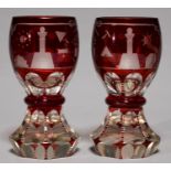 TWO BOHEMIAN RUBY FLASHED GLASS GOBLETS, MID 19TH C, THE OVOID BOWL WHEEL ENGRAVED WITH MASONIC