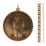 A 9CT GOLD  ST CHRISTOPHER PENDANT, 26MM DIAM, BIRMINGHAM 1972 AND TWO    GOLD CHAINS, 11.8G (3)