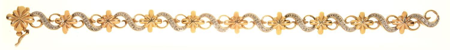 A DIAMOND BRACELET OF ALTERNATE STAR AND SCROLL LINKS, IN 9CT GOLD, 19CM L, MAKER TJ, BIRMINGHAM - Image 2 of 2