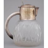 AN EPNS MOUNTED CUT GLASS LEMONADER NJUG, 20TH C, 27CM H Glass undamaged, slight split and wear to