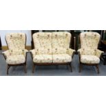 AN ERCOL STAINED ASH THREE PIECE SUITE, COMPRISING SOFA, 140CM W AND PAIR OF ARMCHAIRS Overall