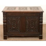A CARVED AND STAINED OAK CHEST, C1900, THE FRONT WITH DEMI FIGURE APPLIQUES, 65CM H; 92 X 48CM Lid