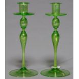 A PAIR OF VENETIAN IRIDESCENT GREEN GLASS CANDLESTICKS, EARLY 20TH C, 25CM H Undamaged, no repair