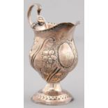 A GEORGE III SILVER PEAR SHAPED CREAM JUG, SPIRALLY FLUTED AND CHASED WITH FLOWERS, 11CM H, MARKS