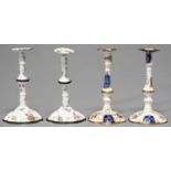 TWO PAIRS OF ENAMEL CANDLESTICKS, LATE 19TH C, IN LATE 18TH C ENGLISH STYLE, PAINTED WITH SPRAYS AND