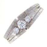A DIAMOND THREE STONE RING, IN TEXTURED 14CT WHITE GOLD, CONVENTION MARK, 3.6G Good condition