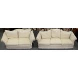 A GRADUATED PAIR OF MODERN CREAM BROCADE TWO AND THREE SEAT DROP ARM SOFAS, SEAT HEIGHT 44CM, 67CM