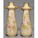 A PAIR OF ART NOUVEAU LIMOGES VASES, C1900, PRINTED AND PAINTED WITH ROSES ON A SHADED APRICOT