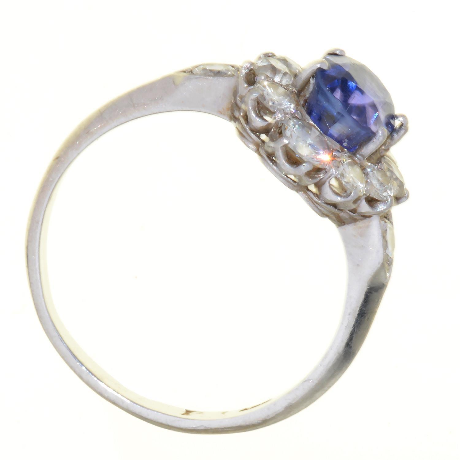 A TANZANITE AND DIAMOND CLUSTER RING, WITH DIAMOND SHOULDERS, IN PLATINUM, BIRMINGHAM 1995, 4.8G, - Image 2 of 2