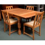 A LIGHT OAK DRAWLEAF TABLE AND A SET OF FOUR CHAIRS, TABLE 74CM H; 91 X 91CM Good clean solid