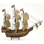 A POLYCHROME WOOD MODEL OF A 16TH C SHIP, WITH MASTS, SAILS AND RIGGINGS, SECOND QUARTER 20TH C,