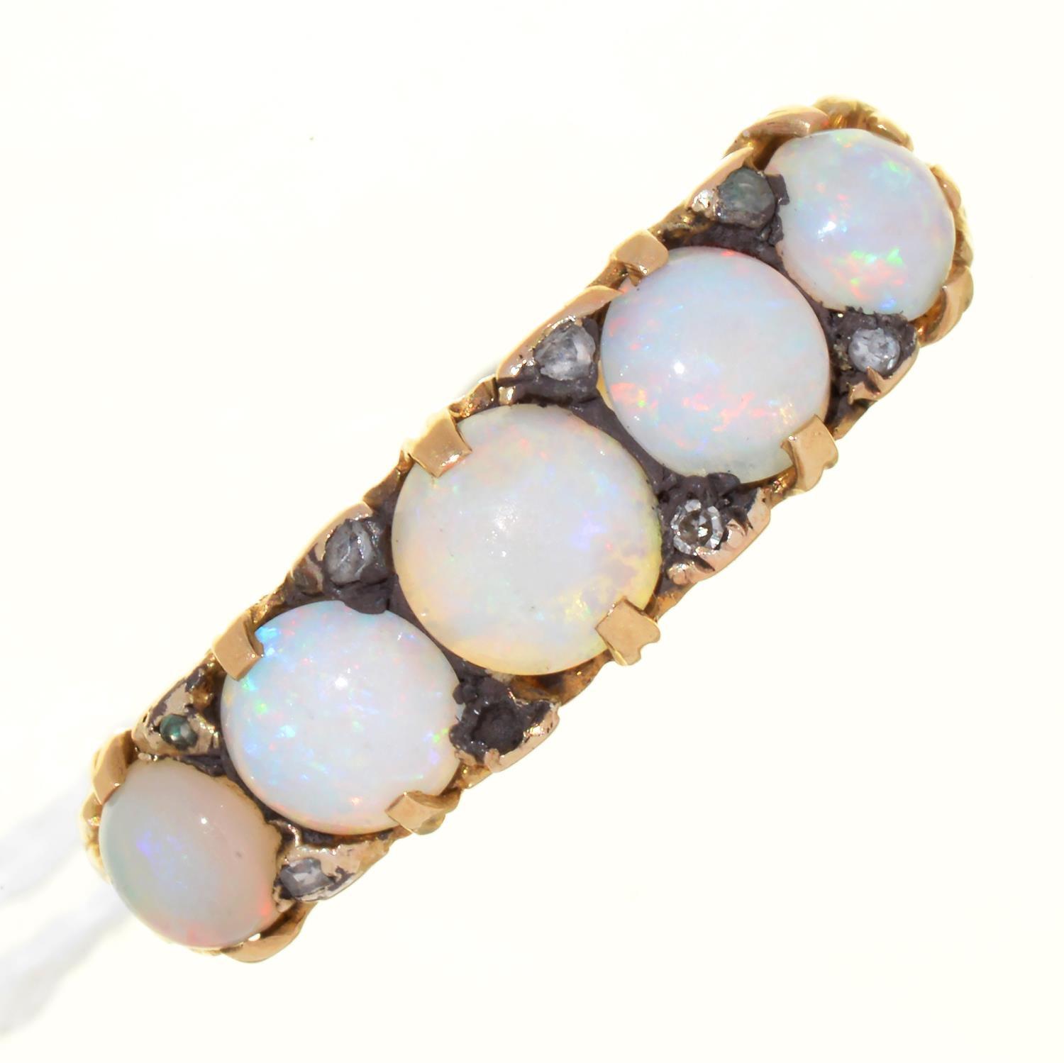 AN OPAL FIVE STONE RING WITH DIAMOND ACCENTS, IN GOLD, UNMARKED, 3.8G, SIZE Q Opals dull from wear