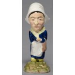 AN A J WILKINSON CARICATURE FIGURE OF A DUTCH WOMAN, MODEL 426, DESIGNED BY CLARICE CLIFF, C1925,
