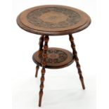 AN EDWARDIAN CARVED WALNUT OCCASIONAL TABLE, C1900, WITH ROUND TOP AND UNDERTIER, ON THREE BOBBIN