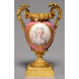 A FRENCH ORMOLU AND SEVRES STYLE PORCELAIN VASE, 19TH C, THE PORCELAIN 18TH C AND REDECORATED, THE