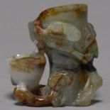 A CHINESE JADE CARVING IN THE FORM OF A LINGZHI AND PINE, 20TH C, 68MM H Good condition
