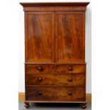 A VICTORIAN MAHOGANY LINEN PRESS, C1850, THE UPPER PART WITH FLARED CORNICE AND FITTED WITH THREE