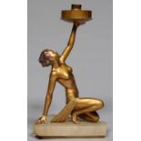 AN ART DECO  GILT PATINATED SPELTER FIGURAL TABLE LAMP IN THE FORM OF A SEMI NAKED CROUCHING