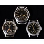 THREE BRITISH MILITARY ISSUE ?DIRTY DOZEN? WRISTWATCHES ? BUREN, CYMA AND TIMOR, 36MM, CASE BACK