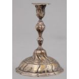 A GERMAN CAST SILVER CANDLESTICK,  18TH C, WRYTHEN FLUTED, 14.5CM H, MARKED n IN SHIELD SHAPED