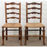 TWO VICTORIAN ASH LADDER BACK DINING CHAIRS, MID 19TH C, RUSH SEATED, SEAT HEIGHT 48CM Numerous