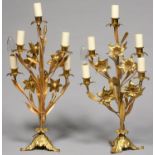 A PAIR OF GILT  BRASS LILY FORM CANDELABRA, C1900, OF FIVE LIGHTS ON TRIPLE LEAF FEET, 53CM H