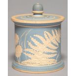 A SALOPIAN ART POTTERY TOBACCO JAR AND COBER, C1900- before 1925, COVERED IN WEDGWOOD BLUE SLIP