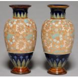 A PAIR OF DOULTON AND SLATER'S PATENT STONEWARE VASES, C1900, 36CM H, IMPRESSED MARKS Both feet